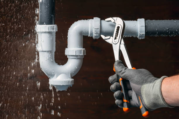Professional Plumbing technician working in Aquebogue, NY